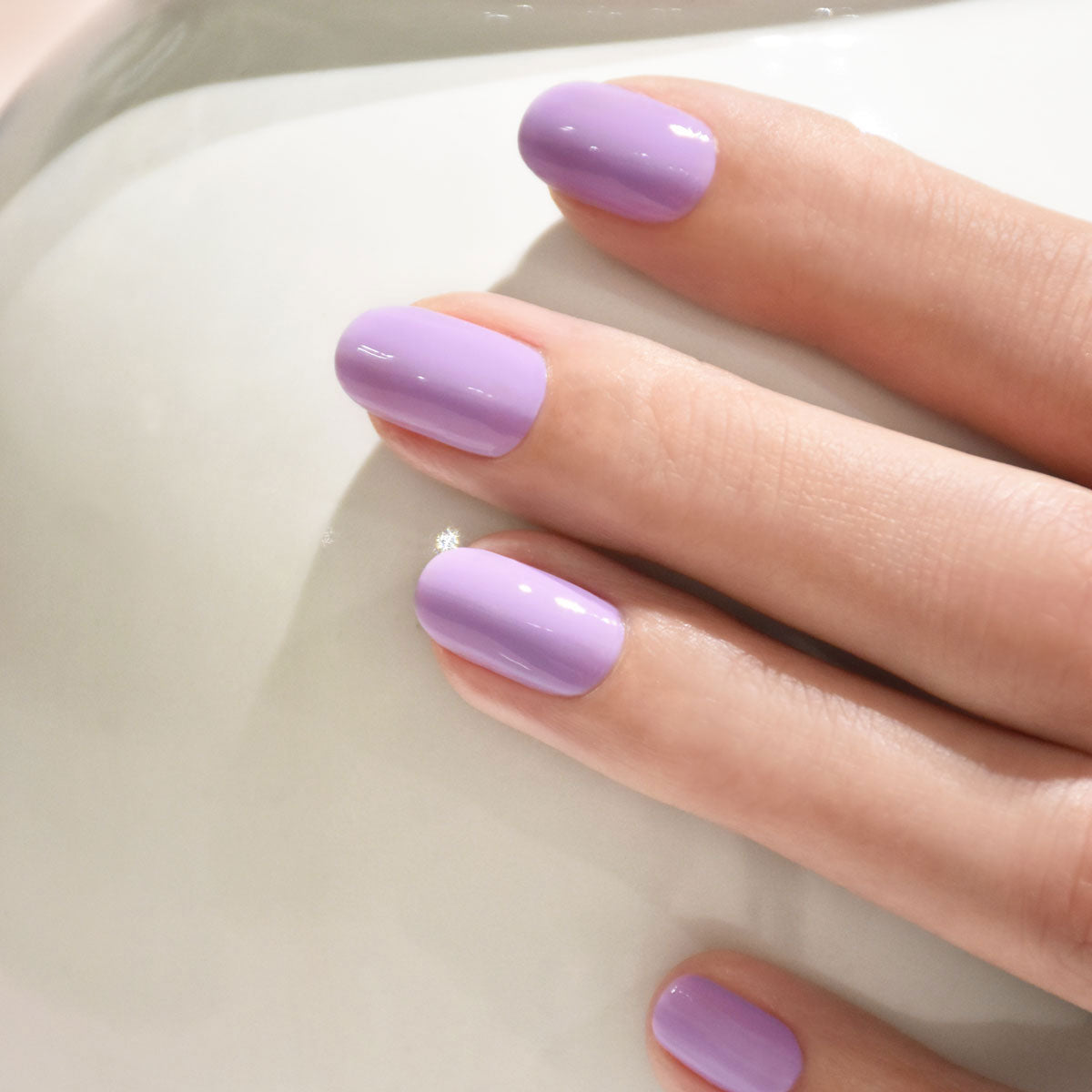 A close-up of neatly manicured nails painted with Manucurist&