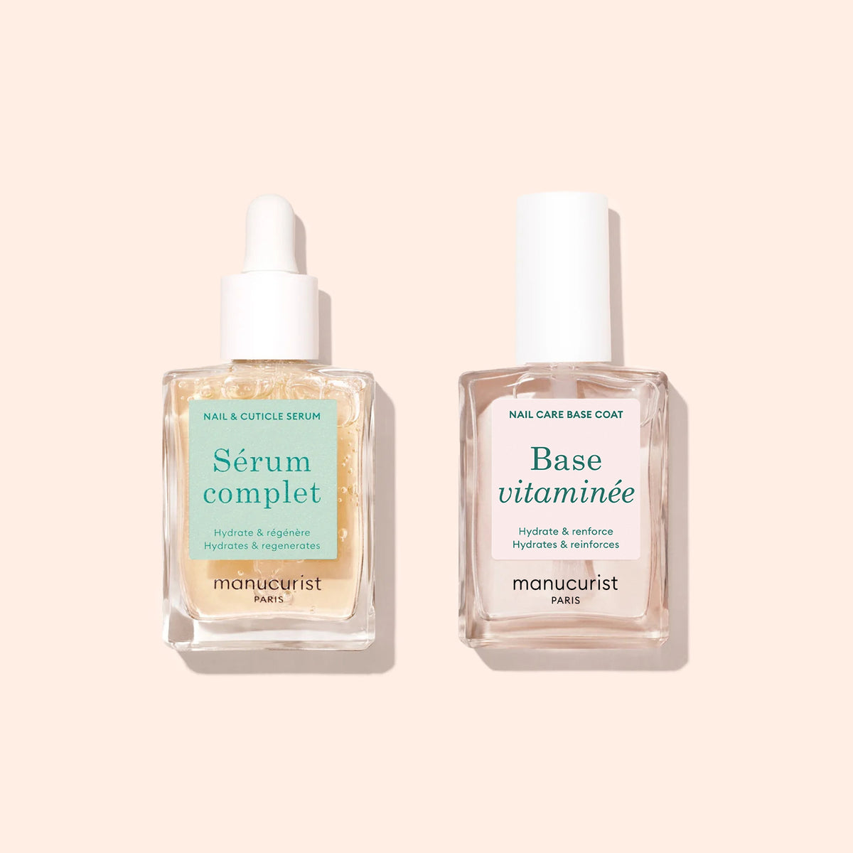 Two clear glass bottles with white caps on a beige background: Complete Serum is a hydrating serum, and Base Vitaminée a nail treatment—both from Manucurist—designed for nail and cuticle care.