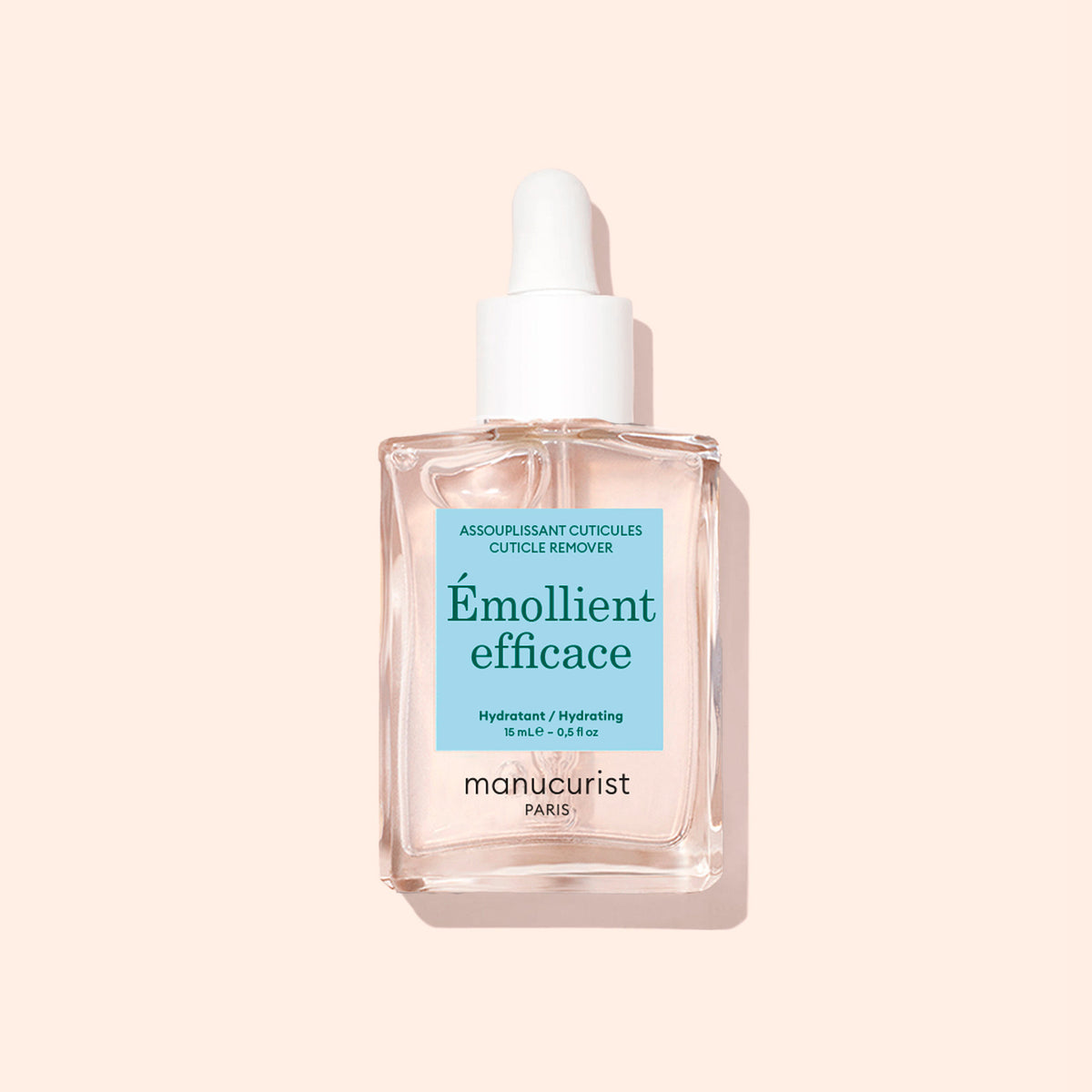 A clear bottle of Manucurist S.O.S Nail Strengthener with a white cap is displayed upright on a light beige background. The bilingual label suits anyone seeking effective nail repair and care for damaged nails.