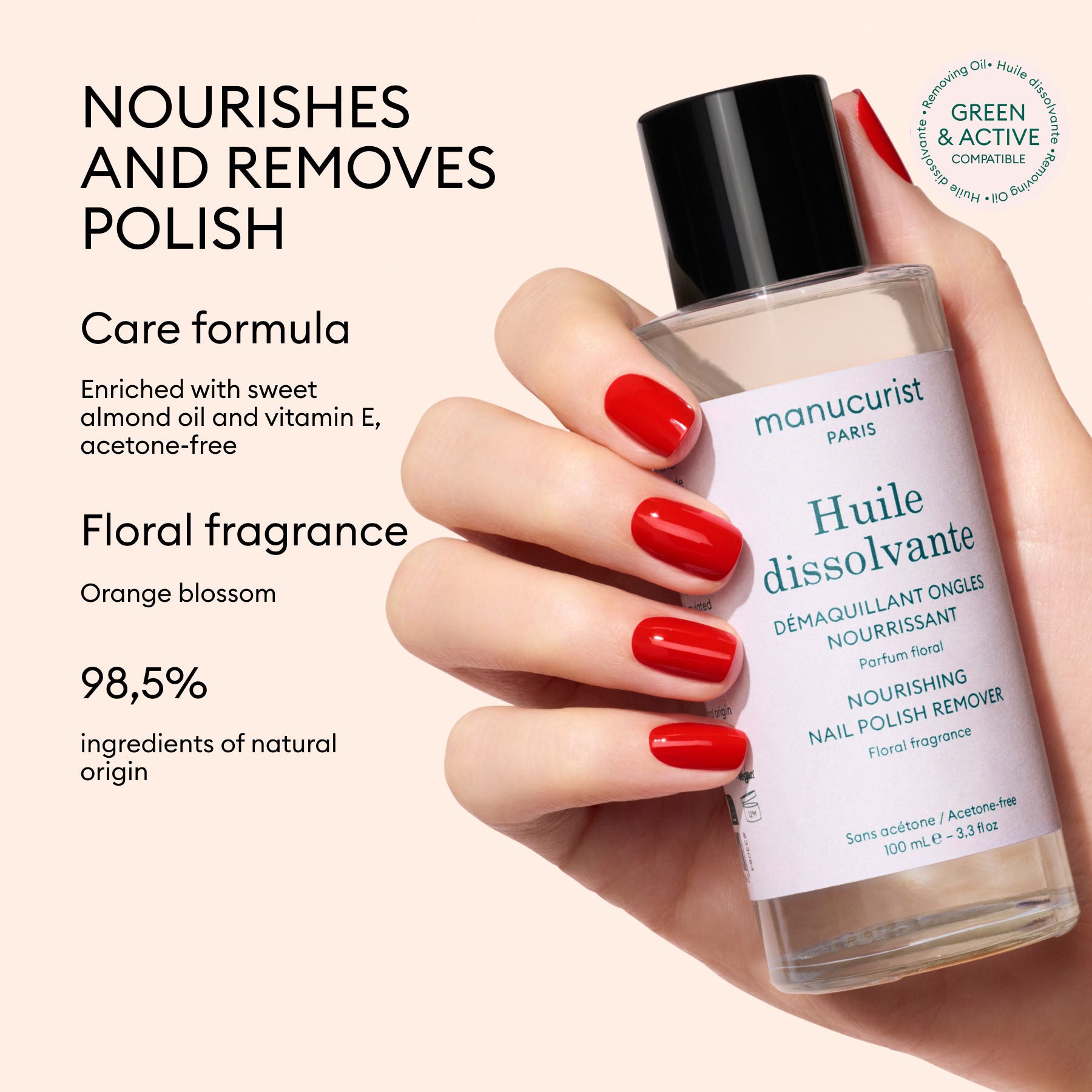 A hand with red-painted nails holds a bottle of Manucurist Green Nail Polish Removing Oil against a light background, with text highlighting the product’s plant-based, acetone-free formula and beneficial ingredients.
