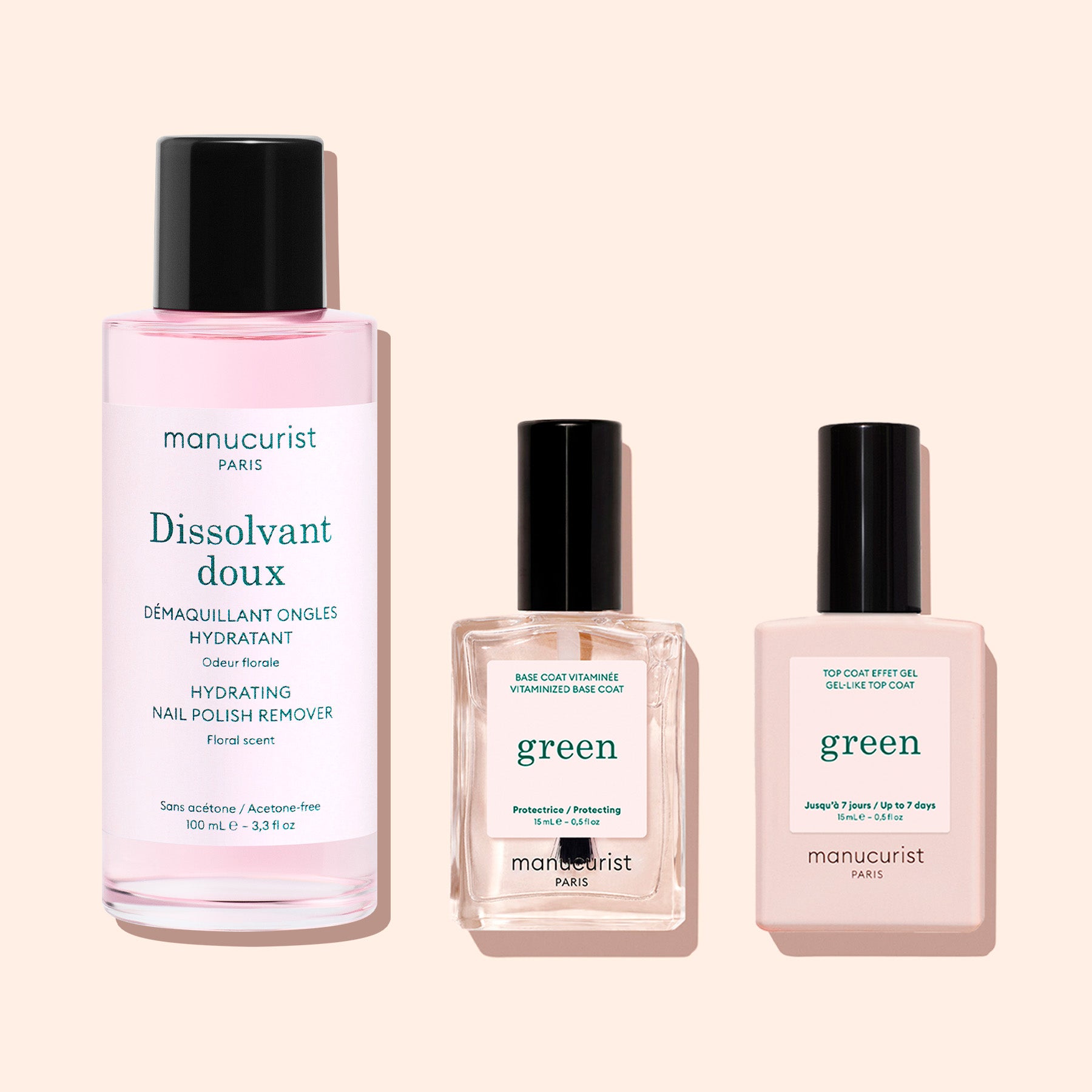 Three Manucurist products—Gentle Remover in a pink bottle, a clear Base Coat, and a light pink Top Coat—are labeled “Manucurist Paris” and displayed on a light background.