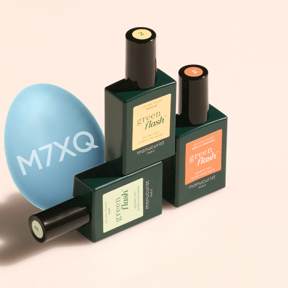 Three rectangular bottles of Manucurist Customisable Trio Green Flash gel polish are stacked in a geometric arrangement on a light beige background, each in green-tinted glass with different colored labels.