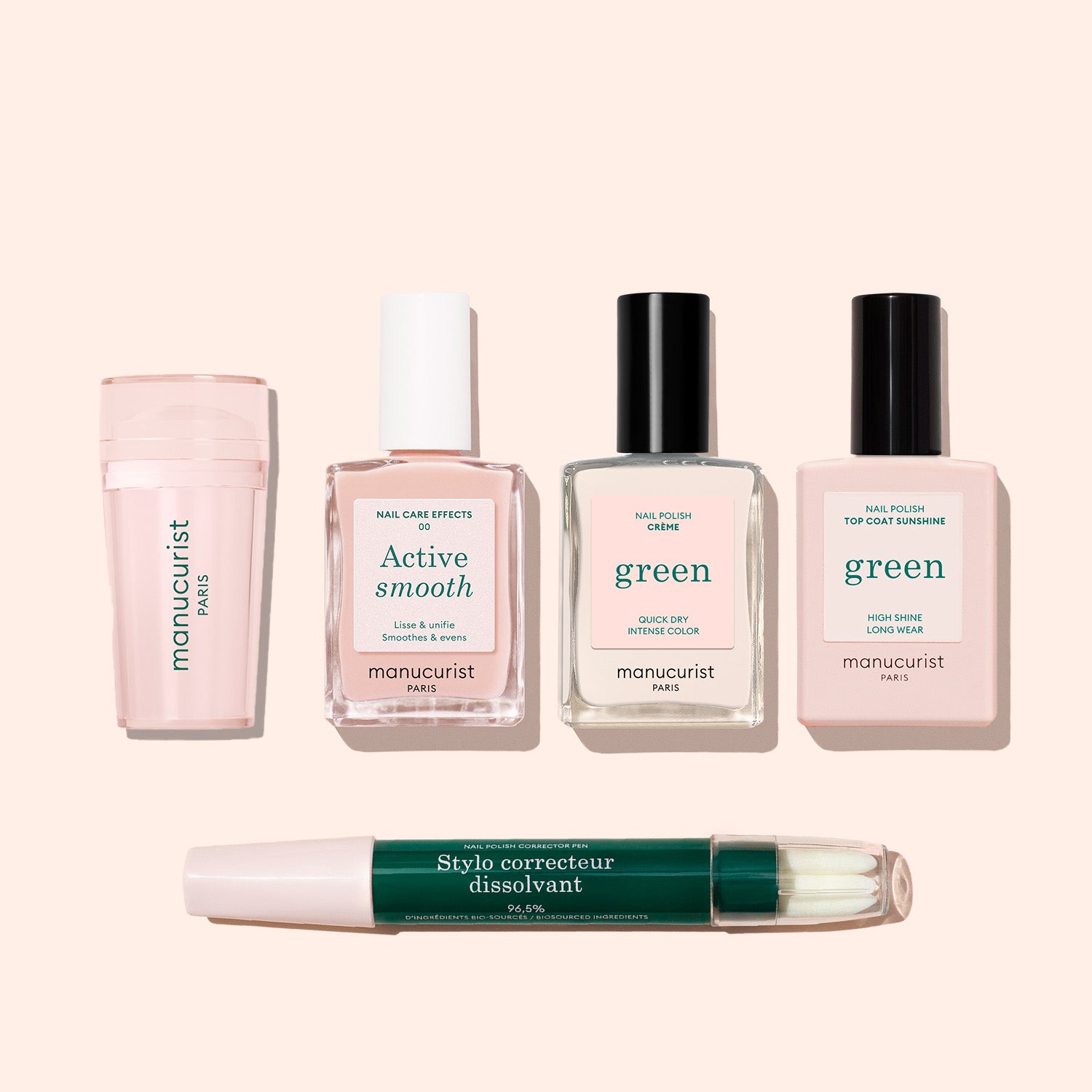 Five Manucurist nail care products, including bottles labeled “Active Smooth,” “Green,” a dual-ended green and white nail corrector pen, and the French Active™ Kit, are displayed on a beige background.