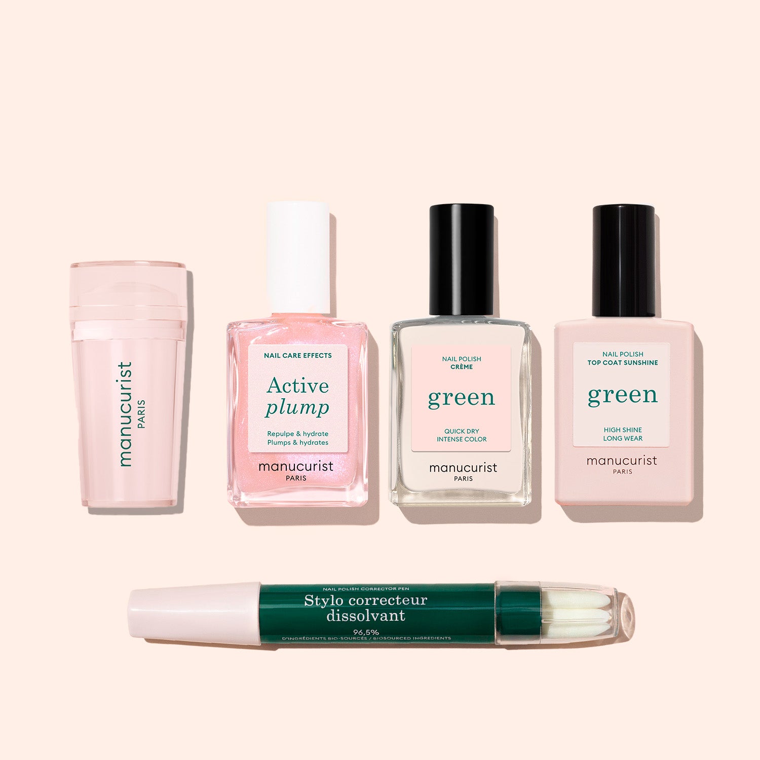 Five French Active™ Kit manicure products are arranged neatly: a light pink nail care stick, a pink “Active Plump” bottle, two clear “Green” polishes with black caps—ideal for French tips—and a green-capped Stylo correcteur dissolvant pen.