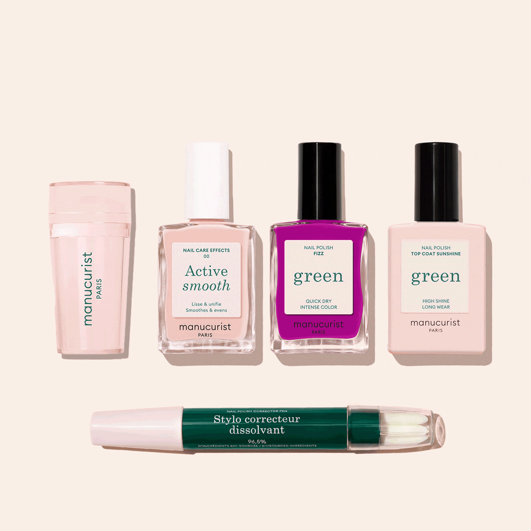 The French Colour Kit includes a powder container, two nude polishes, a bright pink polish, and a green & white corrector pen—ideal for your nail kit or creating flawless French tips. All products displayed on a beige background.