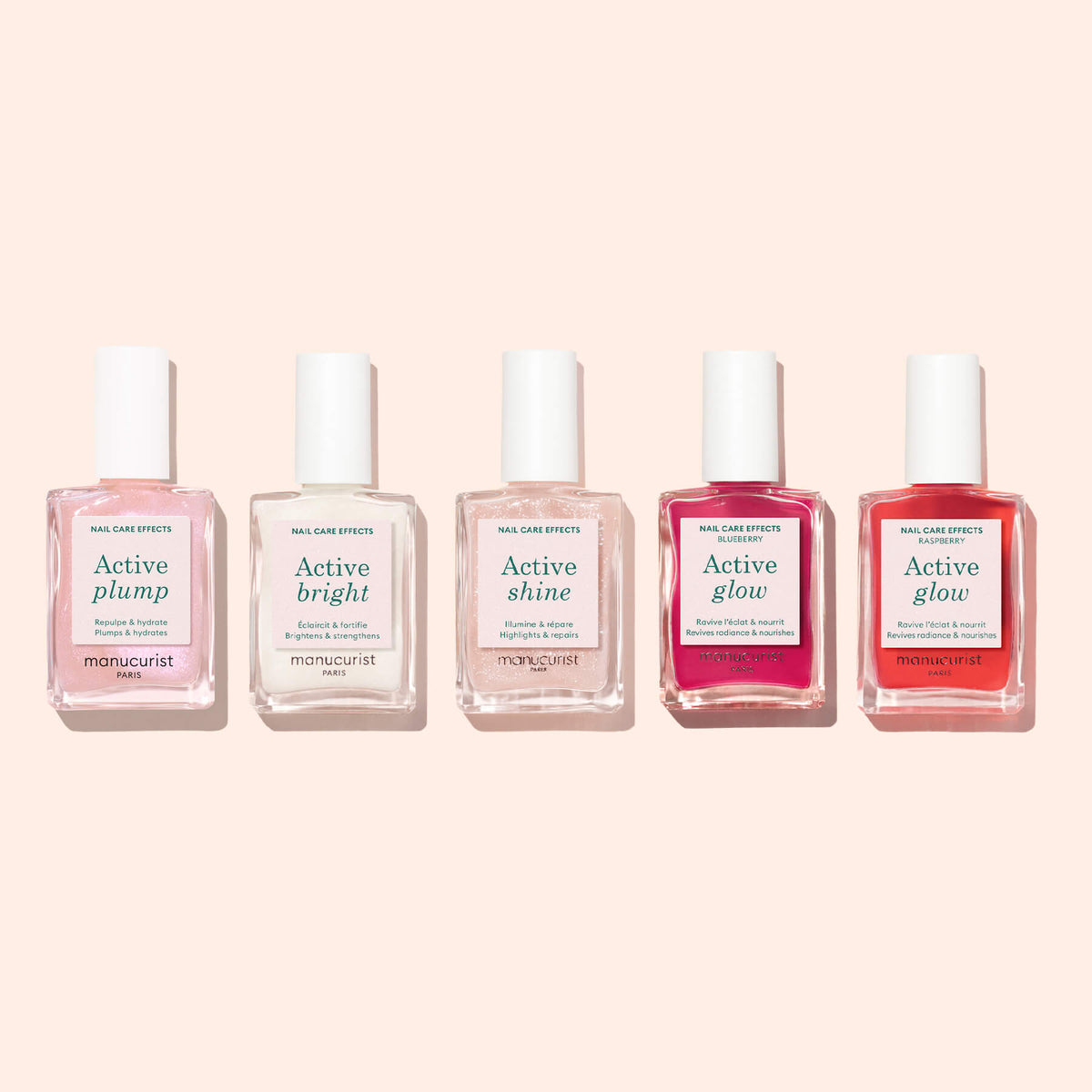 Five bottles of Manucurist Active™ Plump Pink Glazed plant-based nail care polish are lined up in a row, each featuring a unique effect—Plump, Bright, Shine, and two shades of Glow—against a pale pink background, making them perfect for achieving strong, hydrated nails.