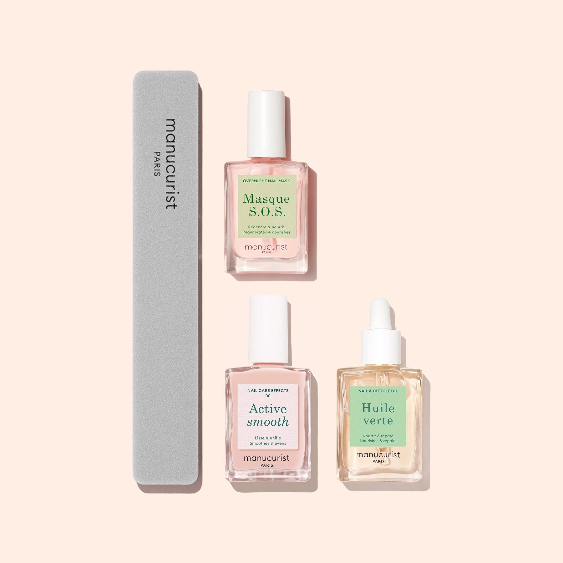The Manucurist Starter Routine - Ridged Nails, featuring a grey nail file and three manicure bottles, is elegantly arranged on a light beige background for a chic nail care setup.