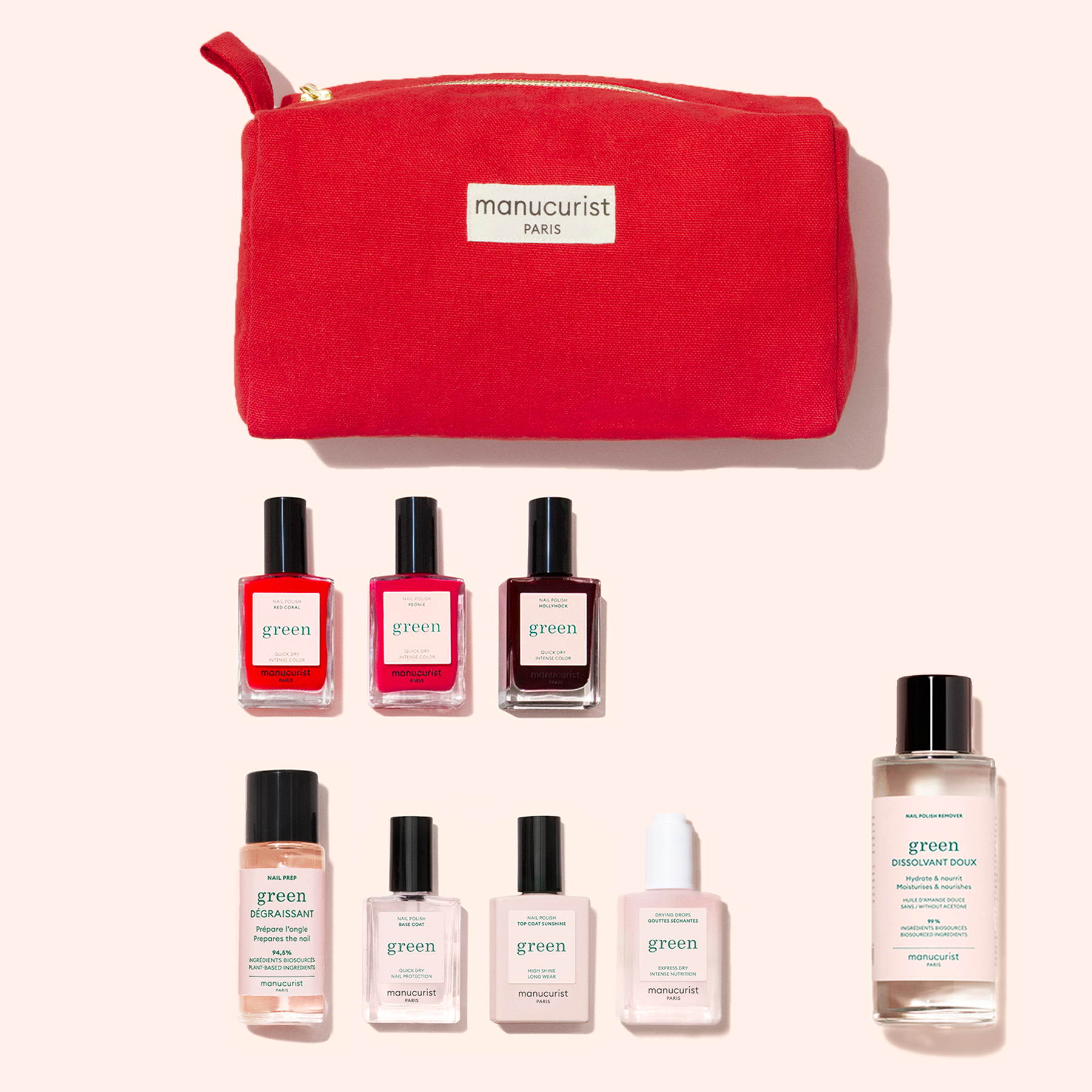 A red Manucurist pouch sits above the Starter Kit, which includes seven plant-based nail polishes in assorted colors and clear liquids, all neatly arranged on a pale background.