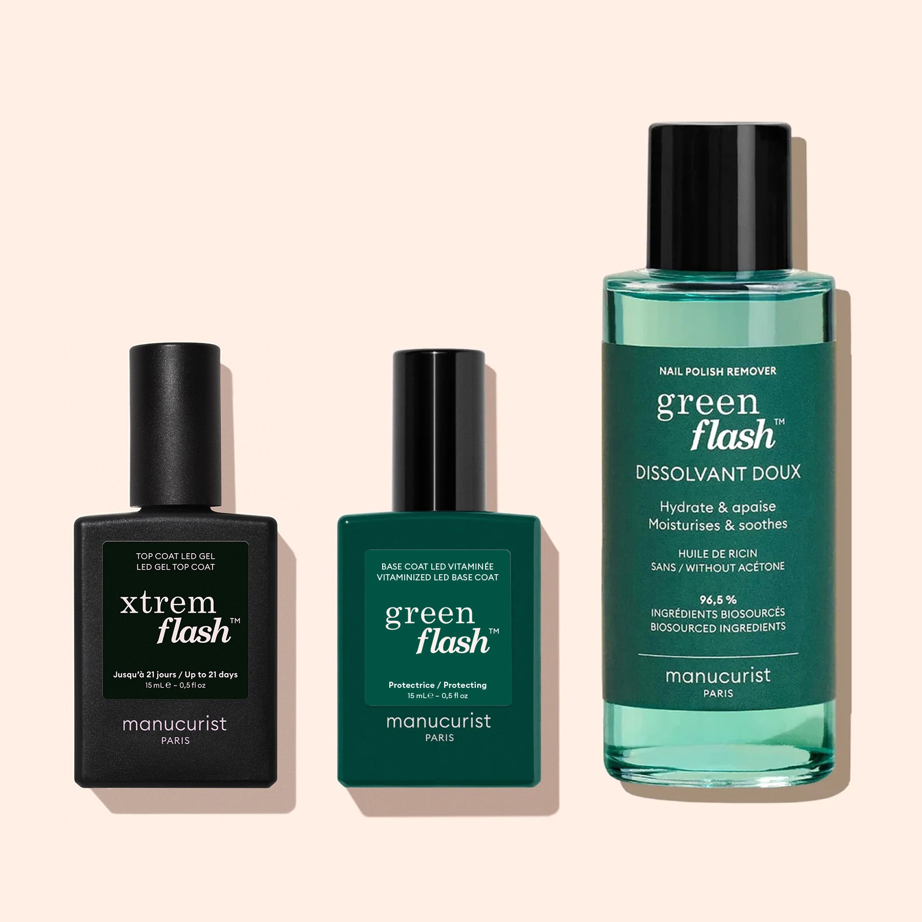 Three manicure products from Manucurist are displayed: the Xtrem Flash™ Gel Top Coat for lasting shine, a green Green Flash base coat, and a clear blue Green Flash nail polish remover in a transparent bottle for quick removal.