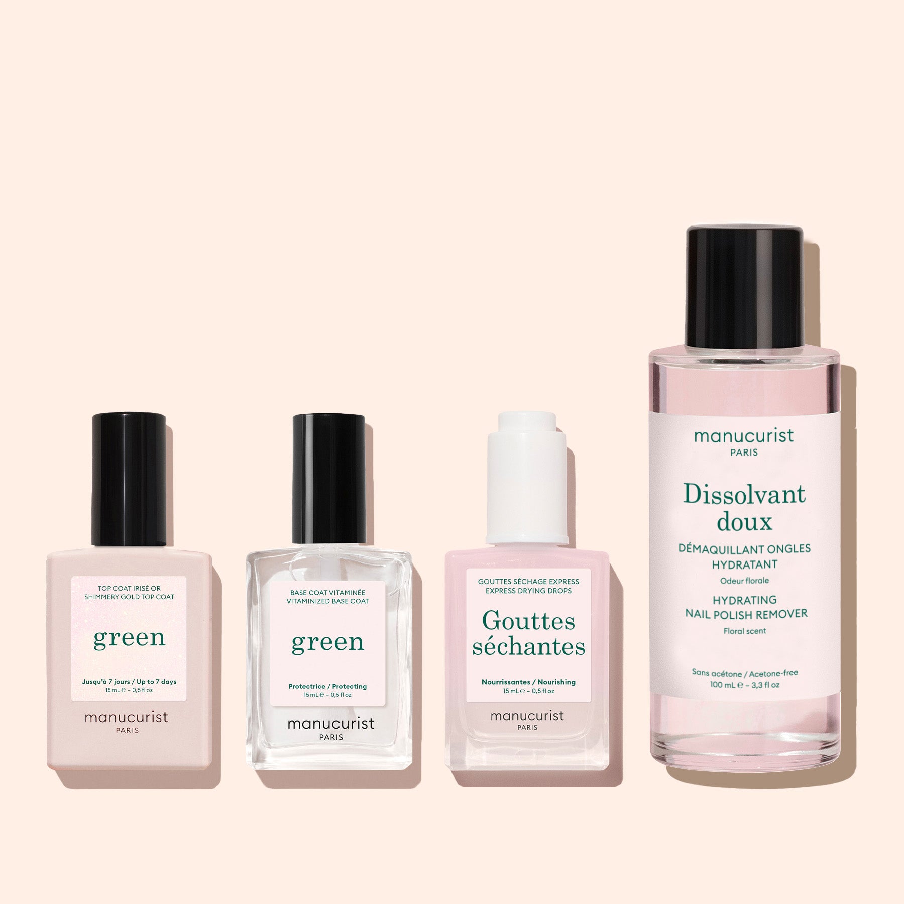 Four manicure products in bottles are arranged in a row on a light pink background. Among them are green, Gouttes séchantes for express air-drying, Dissolvant doux, and Glitter Top Coat by Manucurist.