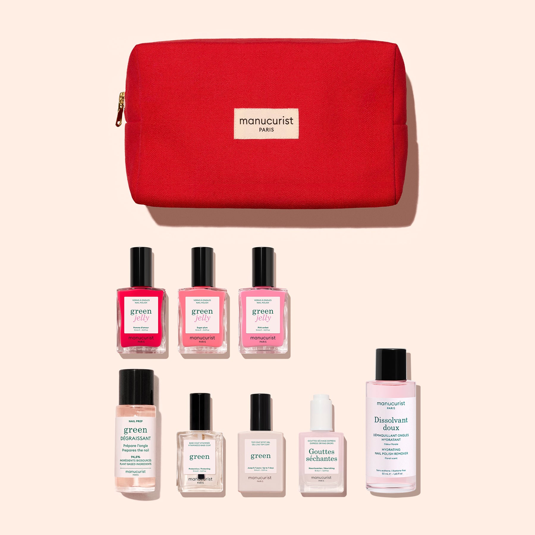 The Manucurist Starter Kit - Jelly Nail Polish includes a red organic cotton pouch containing seven bottles—four gel-effect nail polish shades and three nail care products—plus a pink bottle of nail polish remover, all displayed on a beige background to create the perfect green manicure kit.
