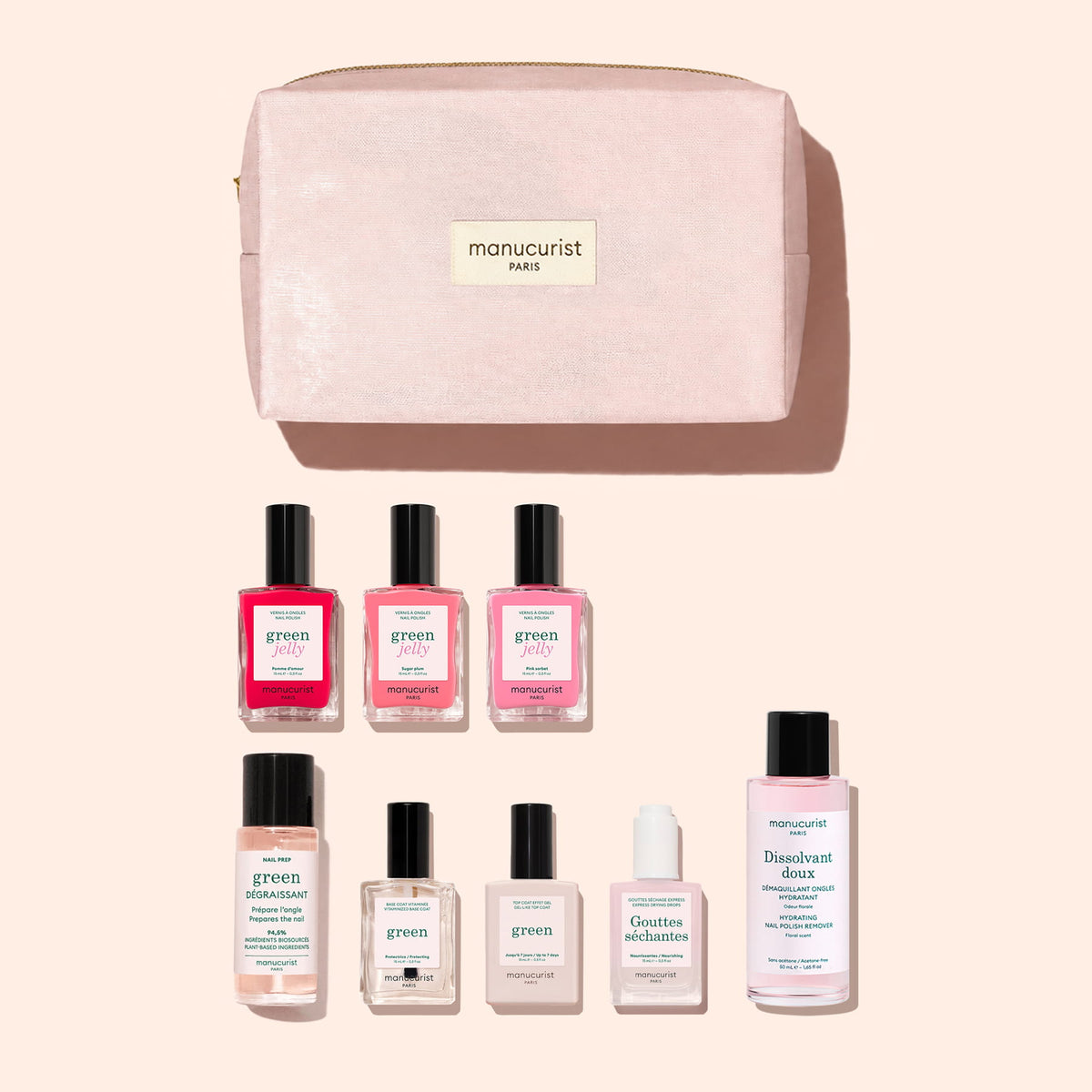 The Manucurist Starter Kit - Jelly Nail Polish features seven nail products, including a gel-effect polish and one cuticle oil, all contained in a pink organic cotton pouch and beautifully displayed on a light beige background.