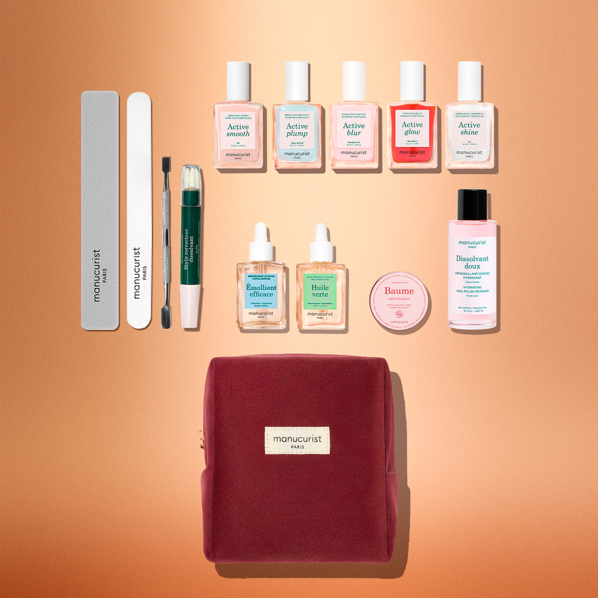 The Active™ Super Ultimate Kit Gift Set includes five bottles of polish, two cuticle serums, a balm tin, polish remover, two files, a cuticle pusher, and a corrector pen, all arranged above a maroon zippered travel case.