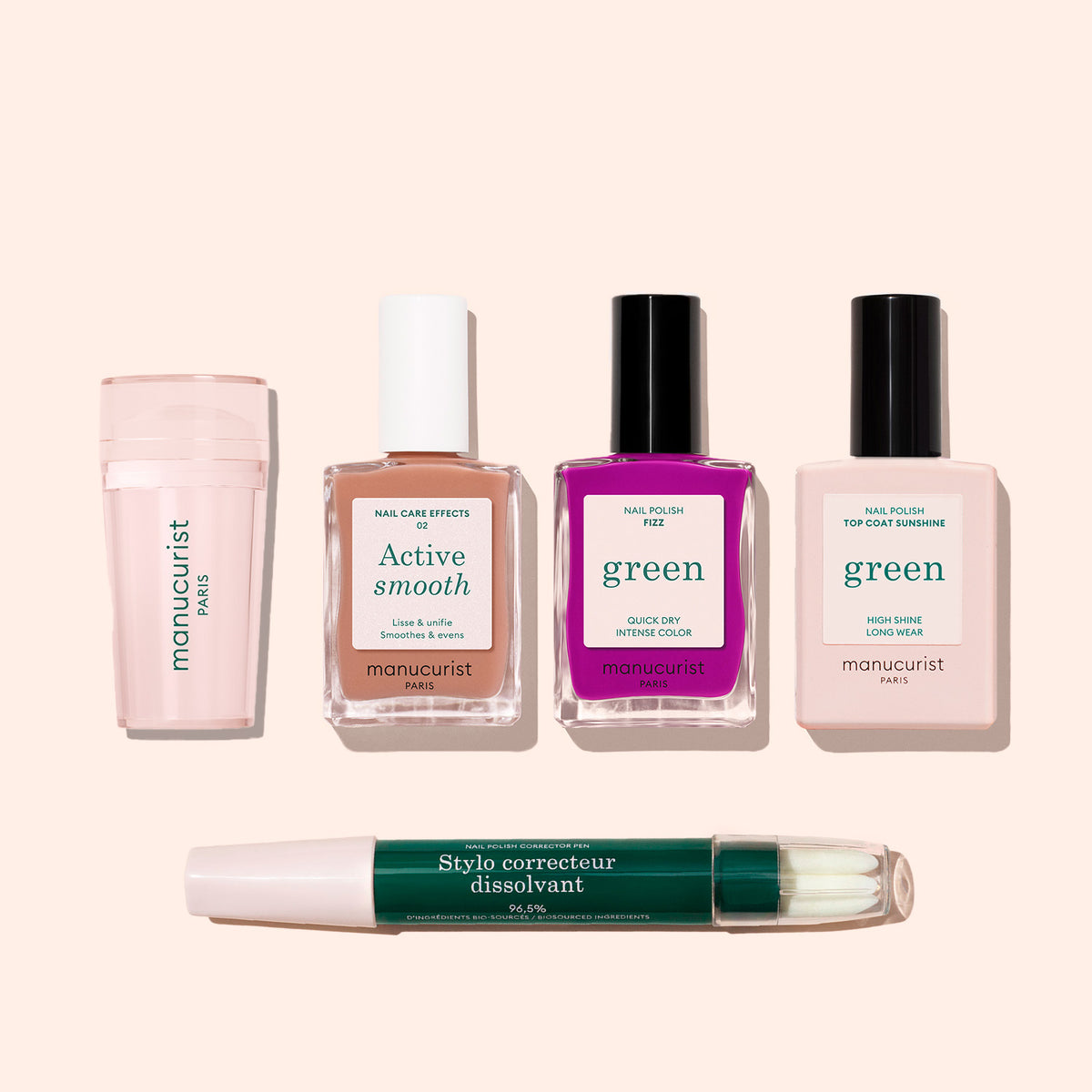 The French Colour Kit includes five manicure essentials—a cuticle remover, nail strengthener, bright pink polish, top coat, and green corrector pen—perfect for creating flawless French tips on a light background.
