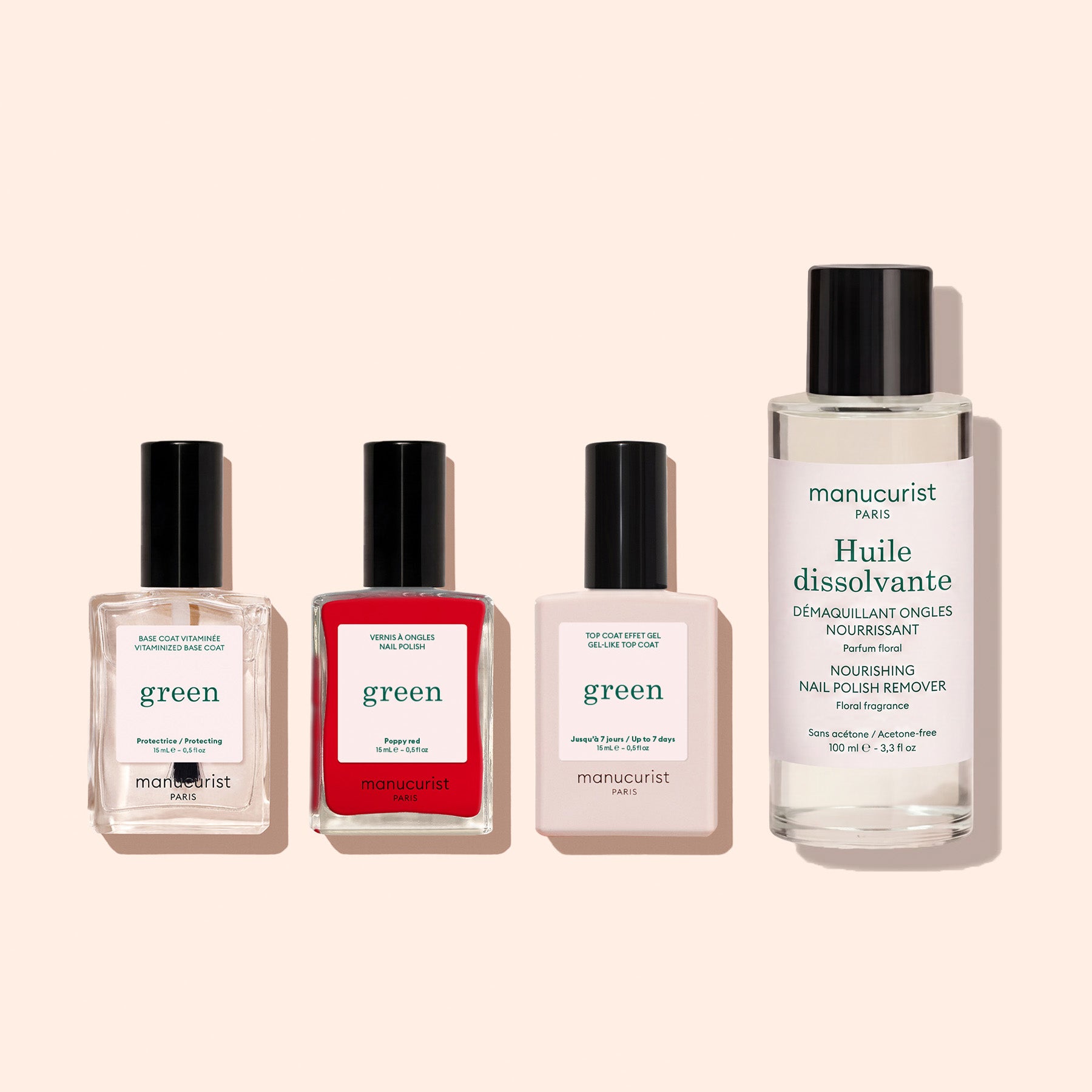 The Basic Kit by Manucurist includes four clear bottles with black caps: pink, red, and clear gel-effect polishes, plus a larger acetone-free remover oil, all displayed against a beige background.