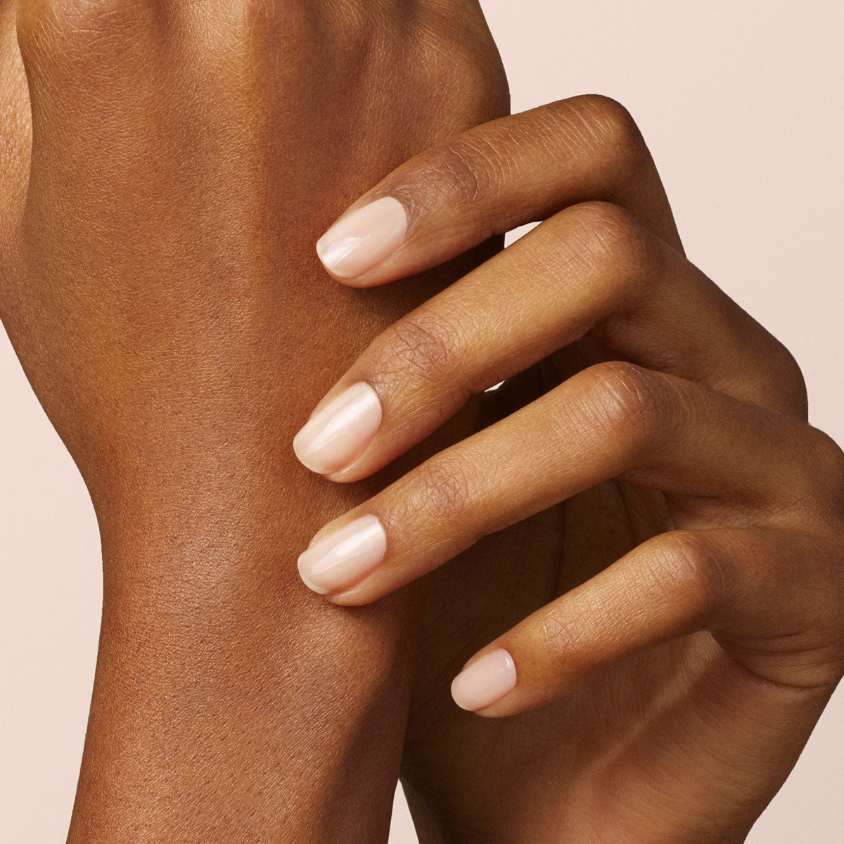A close-up of a hand with nails perfectly coated in Manucurist’s Beige gel polish.
