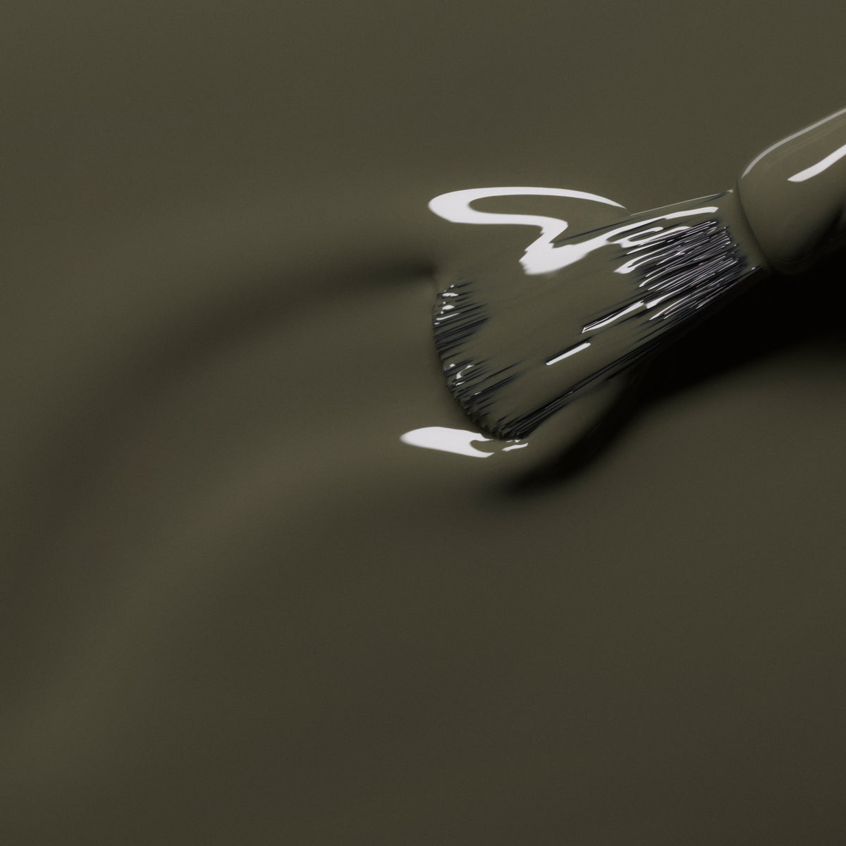 A close-up of a brush applying Manucurist&