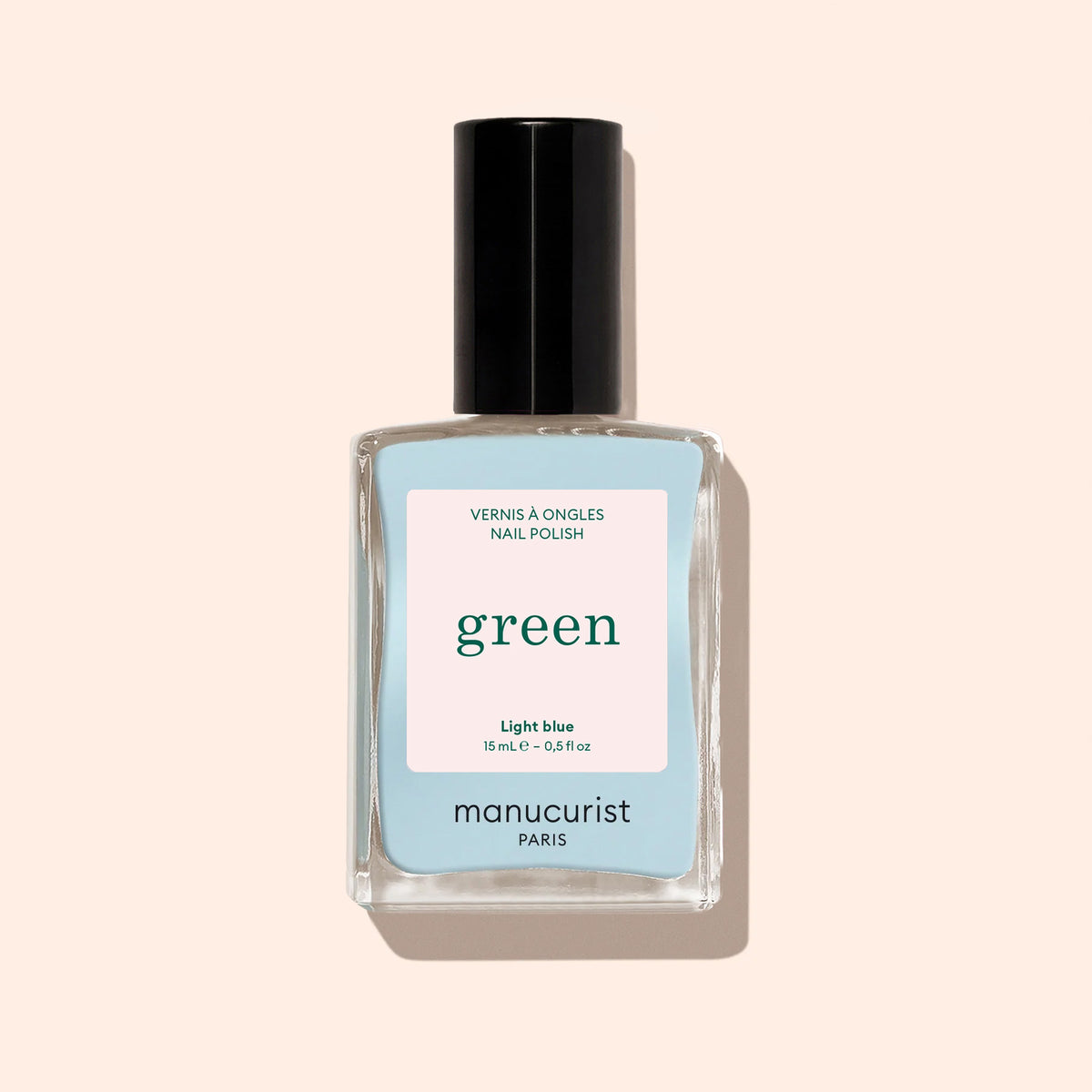 A bottle of Manucurist’s Light Blue nail polish brings soft elegance to your manicure collection.