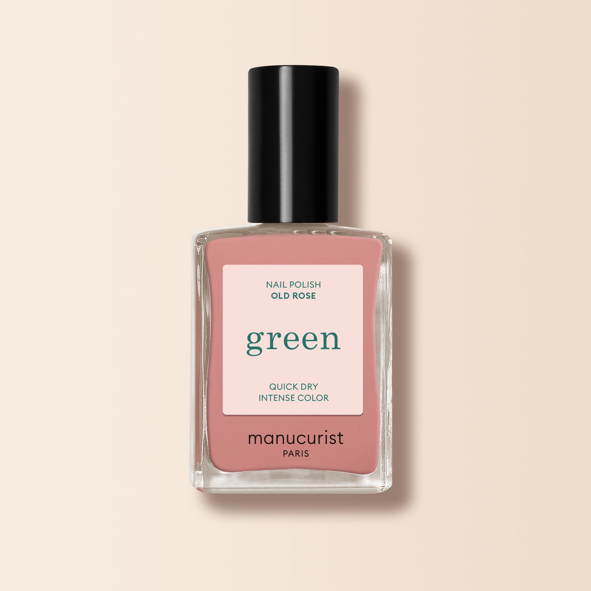 Manucurist Old Rose is a powder pink nail polish from the Green™ range, featuring a black cap and label that notes quick dry, intense color, and plant-based ingredients.