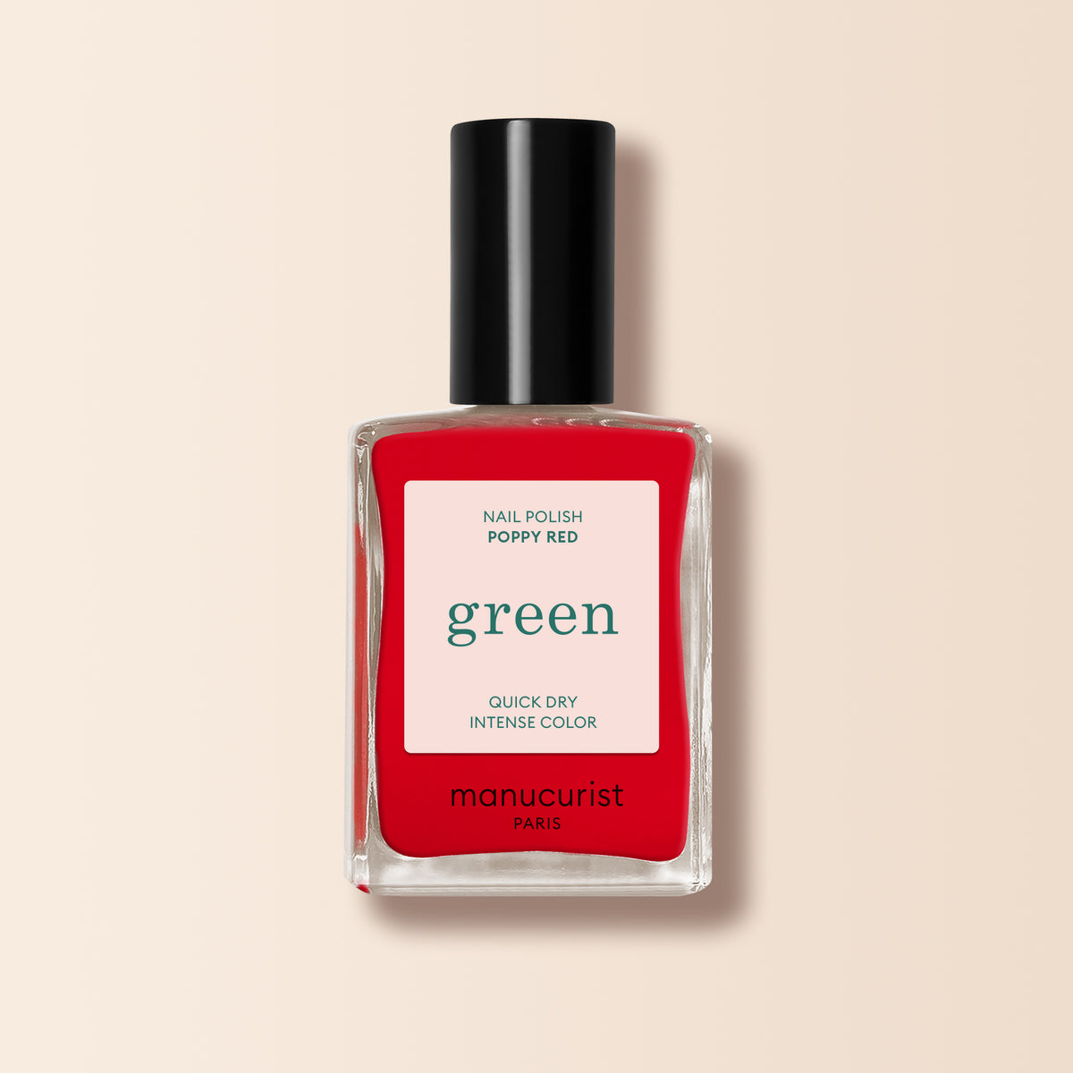 Poppy Red - Free by Manucurist-test is a vibrant orangey red nail polish that adds a bold touch to any look.
