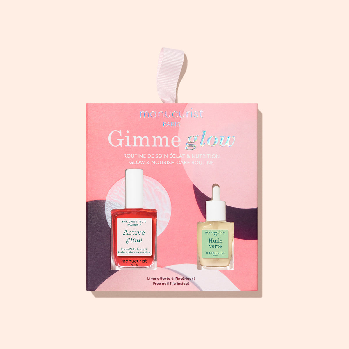 A pink and peach-toned gift set from Manucurist called Active Glow Raspberry, featuring an Active Glow nail care elixir and a dropper bottle of Huile Verte nail oil for natural radiance and enhanced nail care.