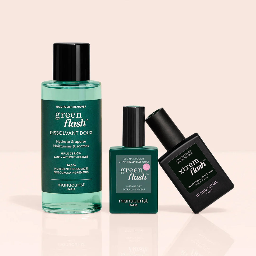 Manucurist Trio Base Top Remover Green Flash™ features three bottles—remover, vegan base coat, and top coat—displayed on a light beige background.