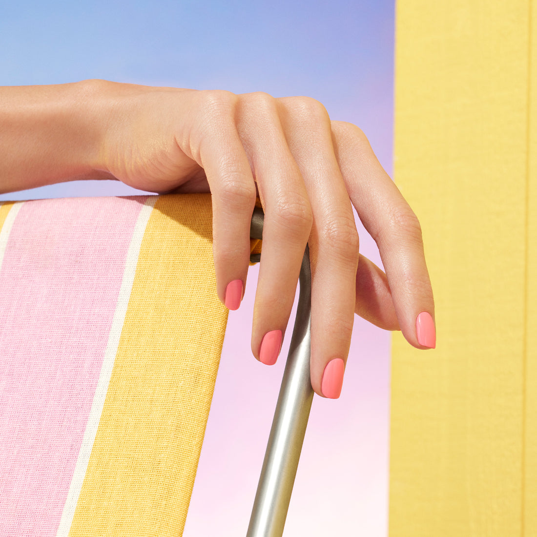 A neatly manicured hand with Manucurist&