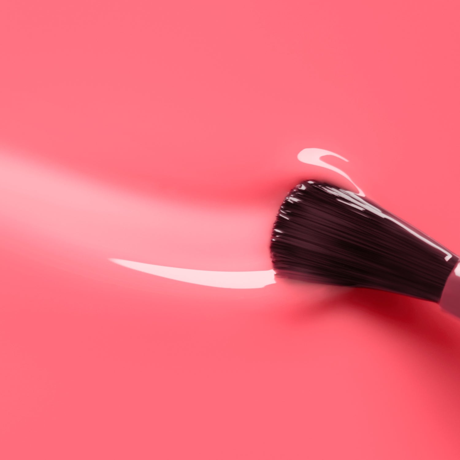 A makeup brush sweeps Manucurist&