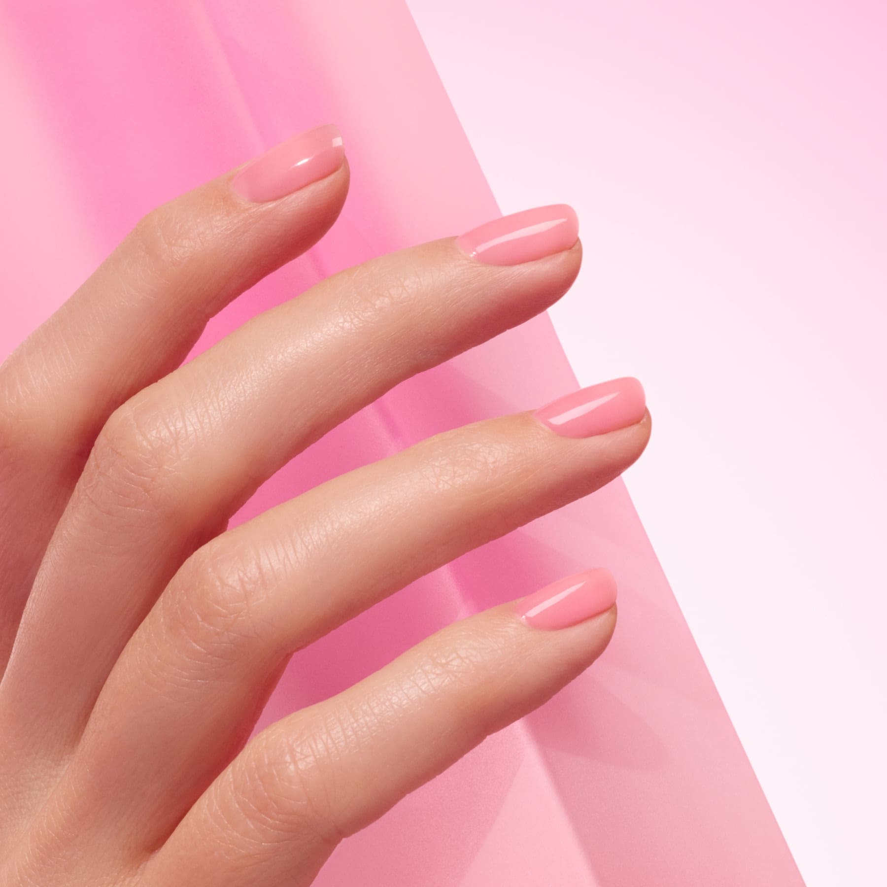 A close-up of a hand with neatly manicured nails painted in Manucurist&
