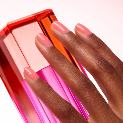 A hand with medium-dark skin tone wears Manucurist&
