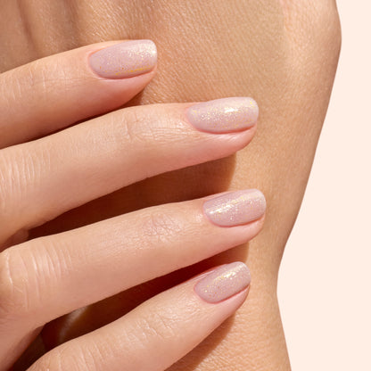 A close-up of a hand with neatly manicured nails featuring Manucurist&