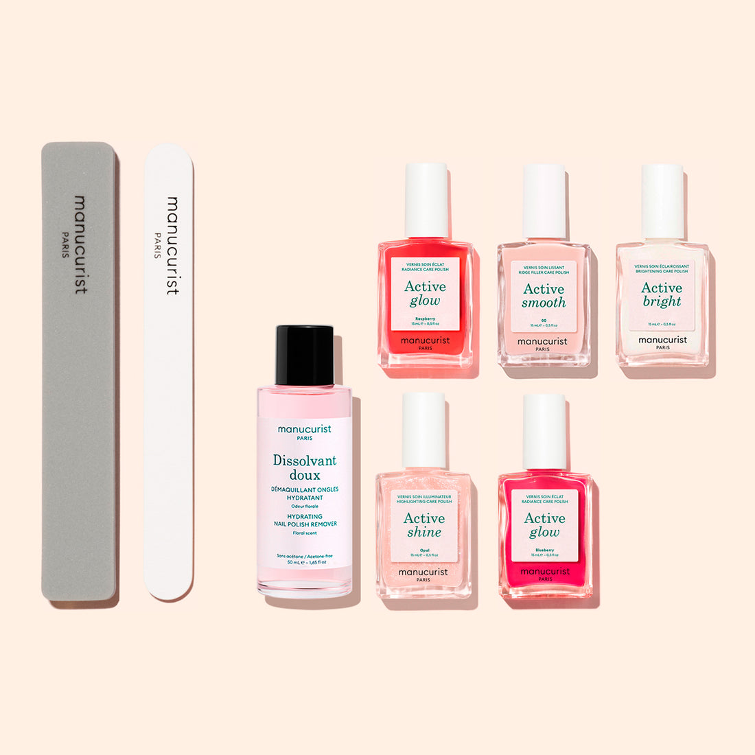 Six pink bottles from the Manucurist Active™ Super Manicure Kit, accompanied by a nail polish remover, nail file, and gray buffer, arranged on a pale background. Perfect for any nail care routine, each bottle is labeled with its specific step: Active Glow, Active Smooth, Active Bright, and Active Shine—making this kit an essential addition to your nail treatment regimen.