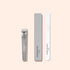 A Manucurist Nail Clipper accompanied by two nail files—one gray, one white—each labeled with the brand name, arranged neatly on a light beige background for the ideal natural nail care and a flawless manicure.