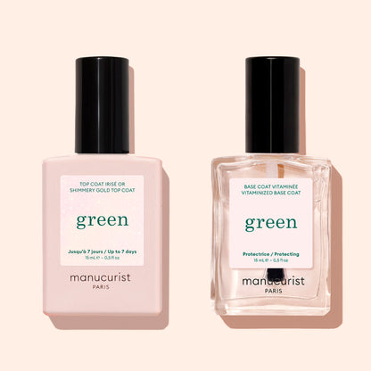 Two bottles of Manucurist nail products: a pink Glitter Top Coat with a gel-like finish on the left and a clear Base Coat on the right, both with black caps, set against a light beige background.