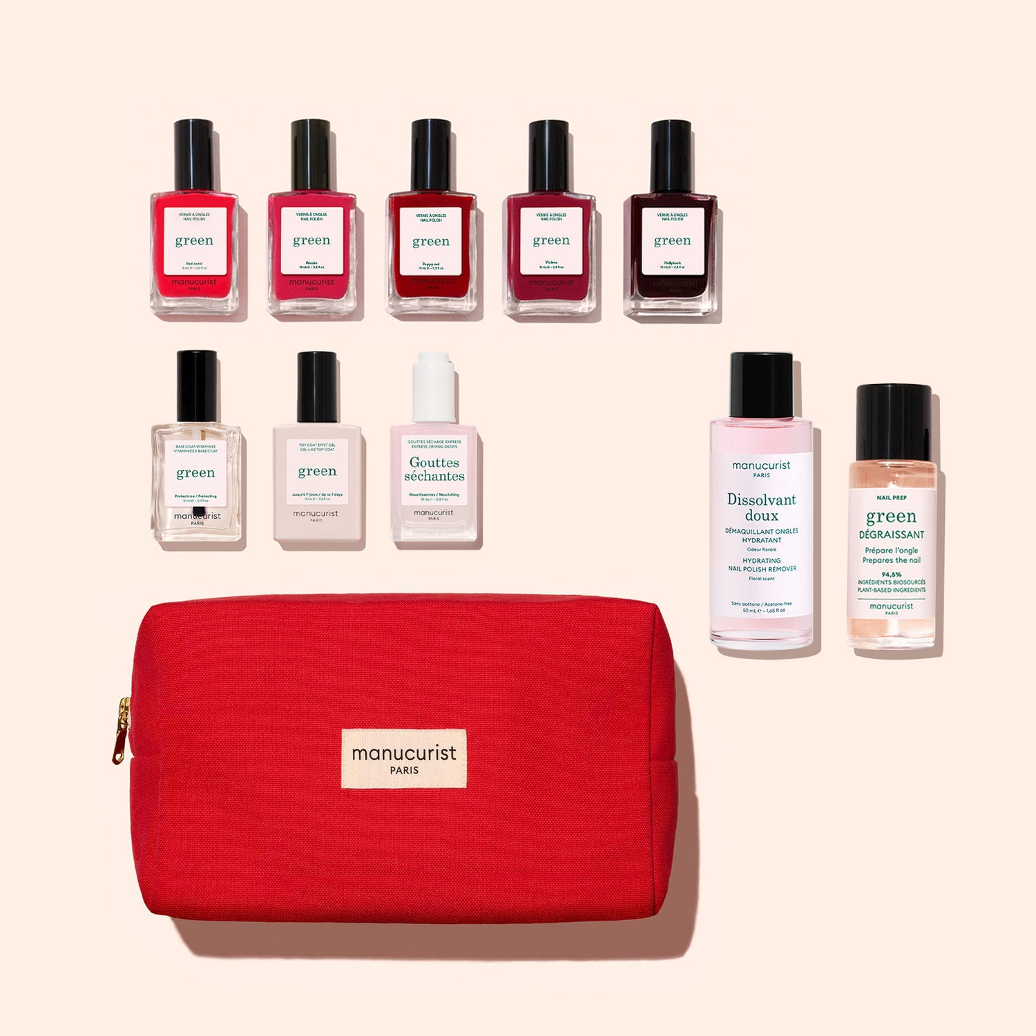 A red organic cotton pouch labeled with the Manucurist logo sits next to the ten gel-effect nail polish bottles and two nail care bottles included in the Manucurist Super Starter Kit, all neatly arranged on a beige background.