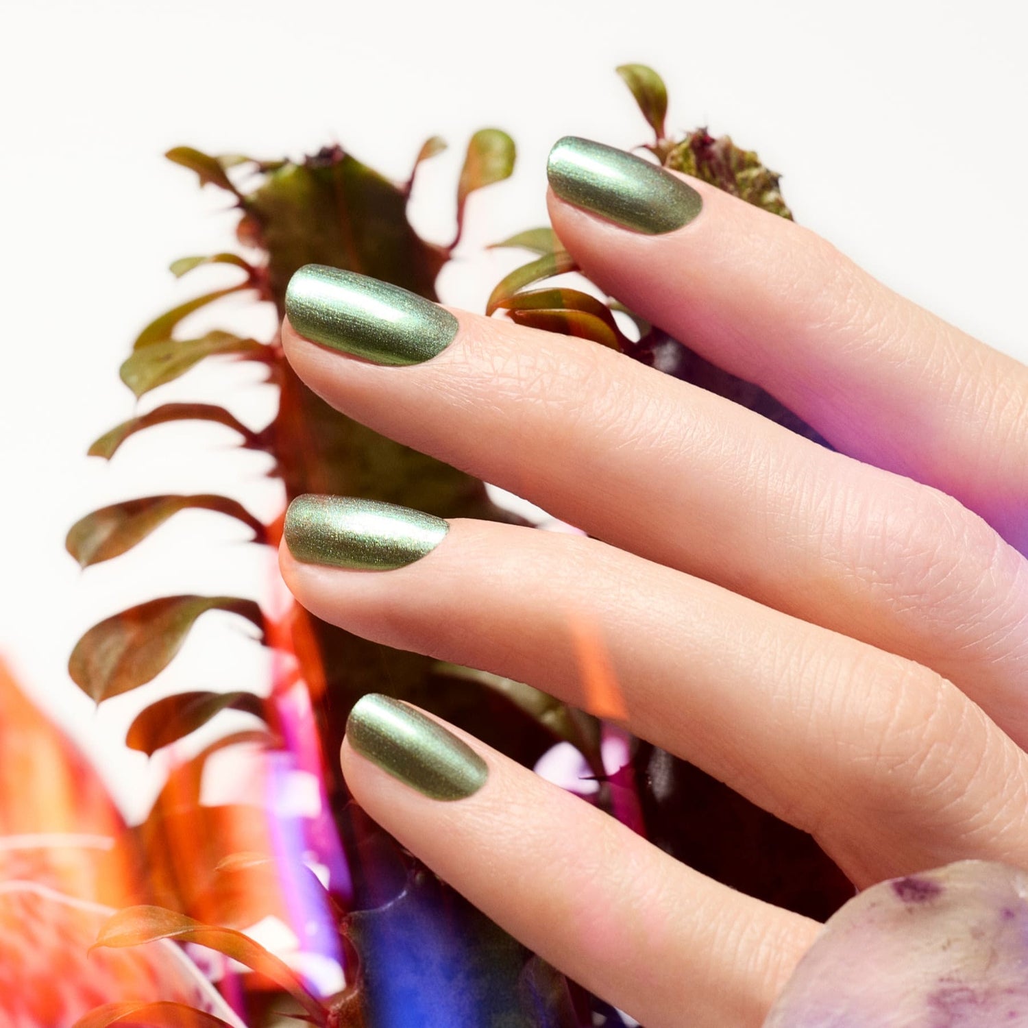 A close-up of a hand wearing Manucurist&
