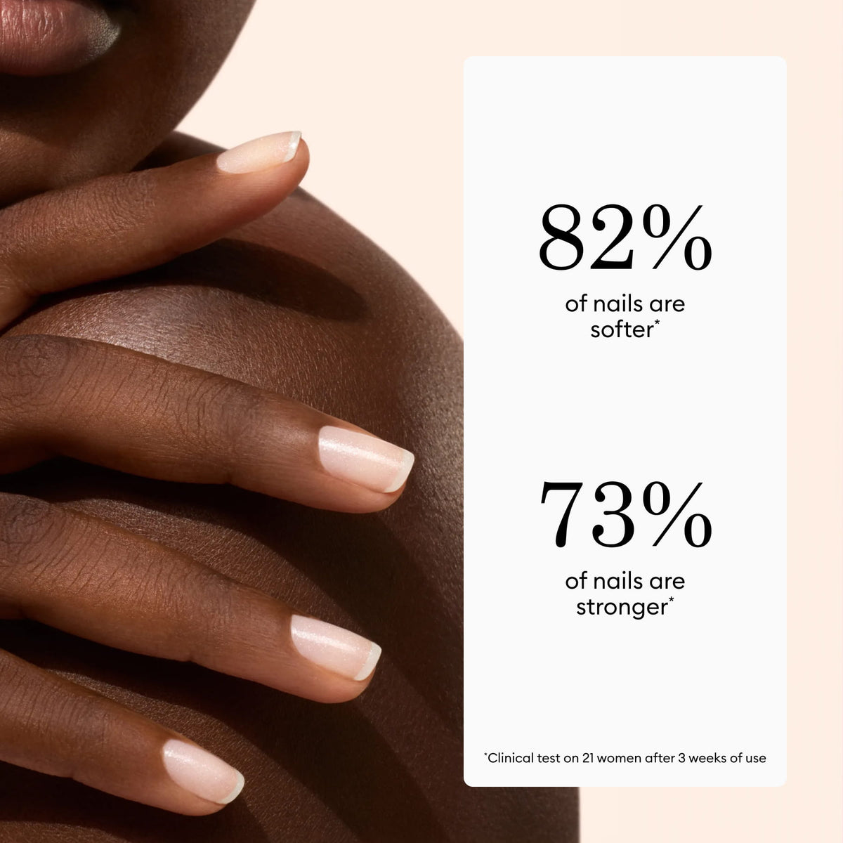 Close-up of a woman’s hand with manicured nails touching her shoulder, highlighting the effects of Manucurist Active™ Shine Icy. Beside her, text reads: 82% of nails are softer. 73% of nails are stronger. Based on clinical testing.