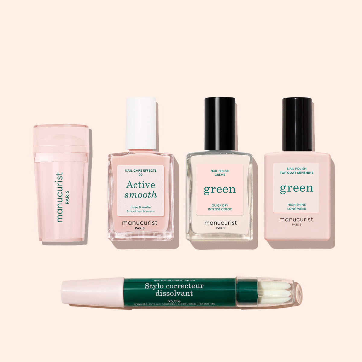 Five Manucurist nail care products, including bottles labeled “Active Smooth,” “Green,” a dual-ended green and white nail corrector pen, and the French Active™ Kit, are displayed on a beige background.
