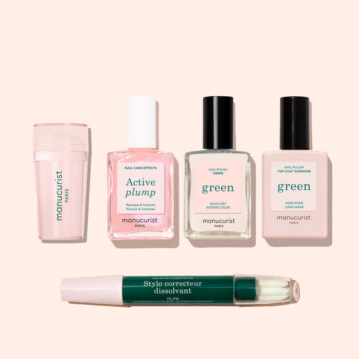 Five French Active™ Kit manicure products are arranged neatly: a light pink nail care stick, a pink “Active Plump” bottle, two clear “Green” polishes with black caps—ideal for French tips—and a green-capped Stylo correcteur dissolvant pen.