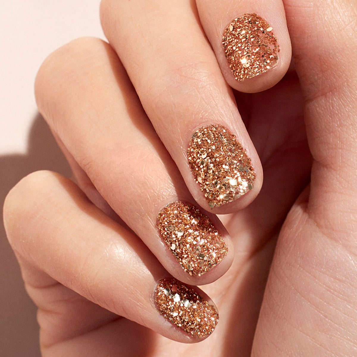 A close-up of neatly manicured nails painted with Manucurist&
