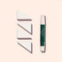 A Manucurist Nail Art Sponges - x4 set is displayed in a row next to a green and white concealer pen, all arranged vertically on a light beige background.
