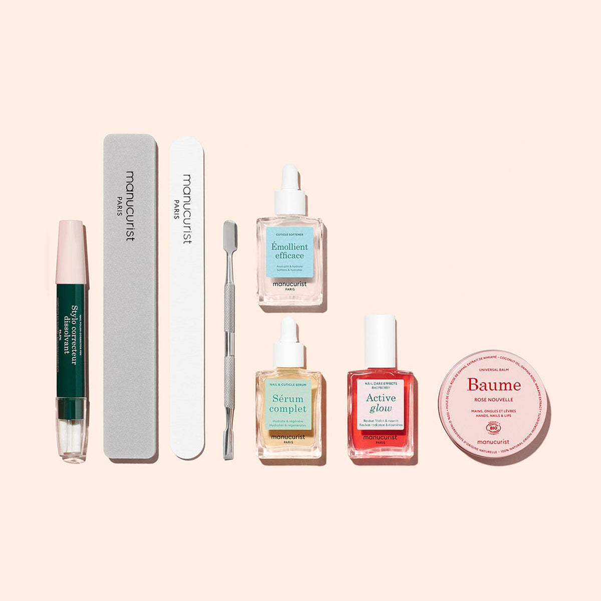 The Manucurist Healthy Glow Duo—a set featuring nail care essentials—adds a chic touch to your routine, beautifully presented against a light pink background for an effortless glow.