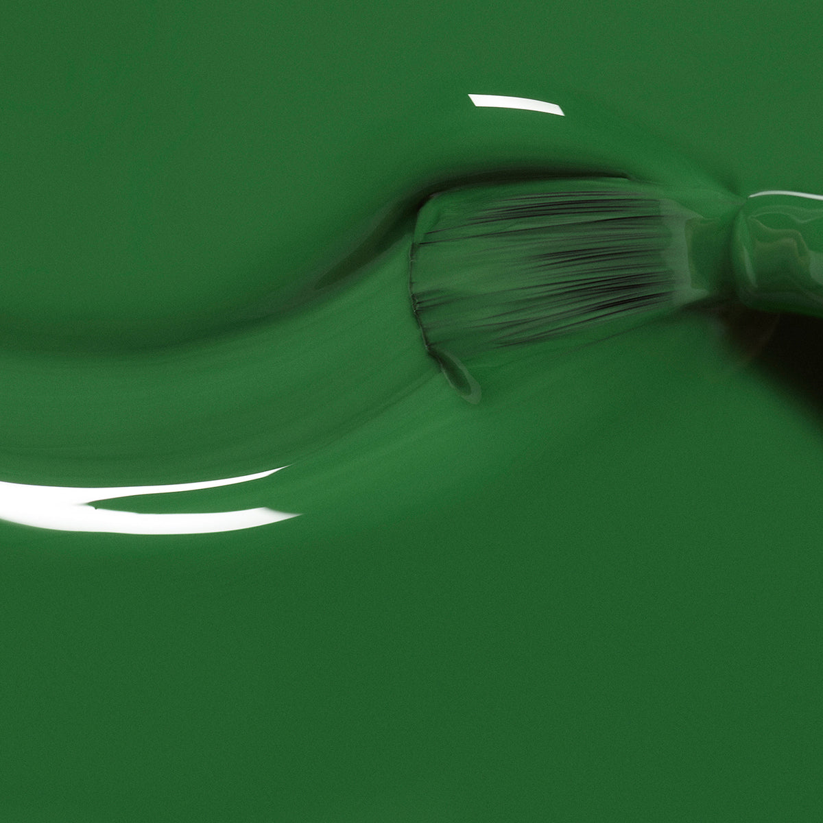 A close-up shows a paintbrush spreading Manucurist&