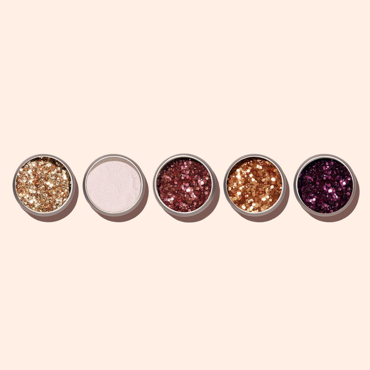 Five round containers of Manucurist&