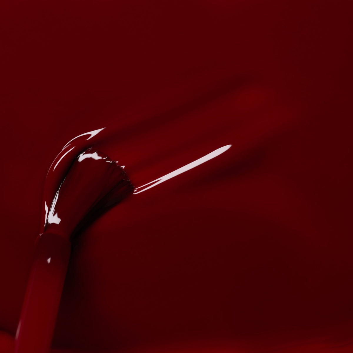 A close-up of a brush applying Manucurist&