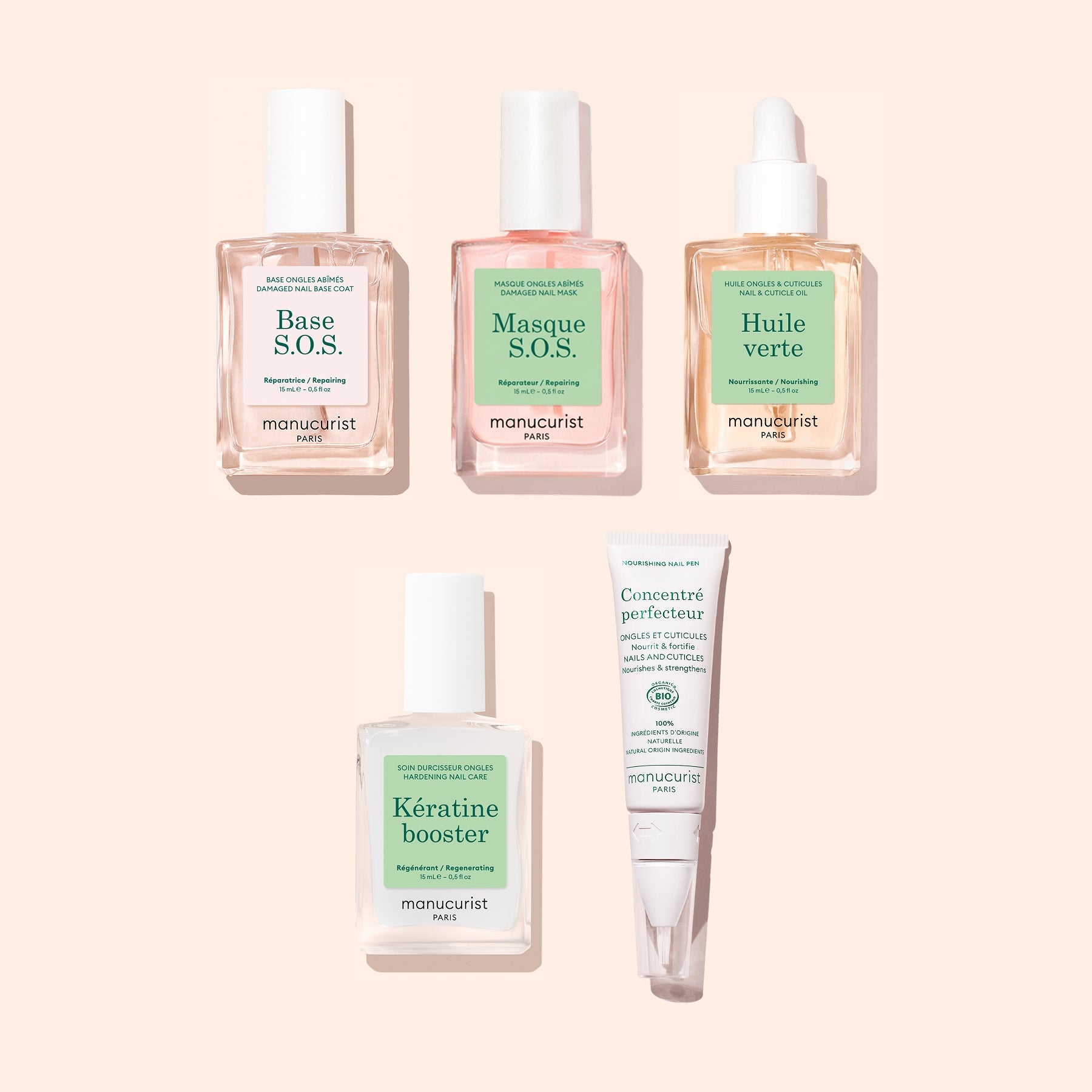 Five manicure essentials from Manucurist’s Basic Routine - Damaged Nails set—base, mask, oil, booster, and concentrate—are arranged neatly on a light pink background. Each product is housed in a clear or white bottle with fresh green and pink labels, making them perfect for repairing damaged nails and strengthening brittle tips while elevating your nail care routine.