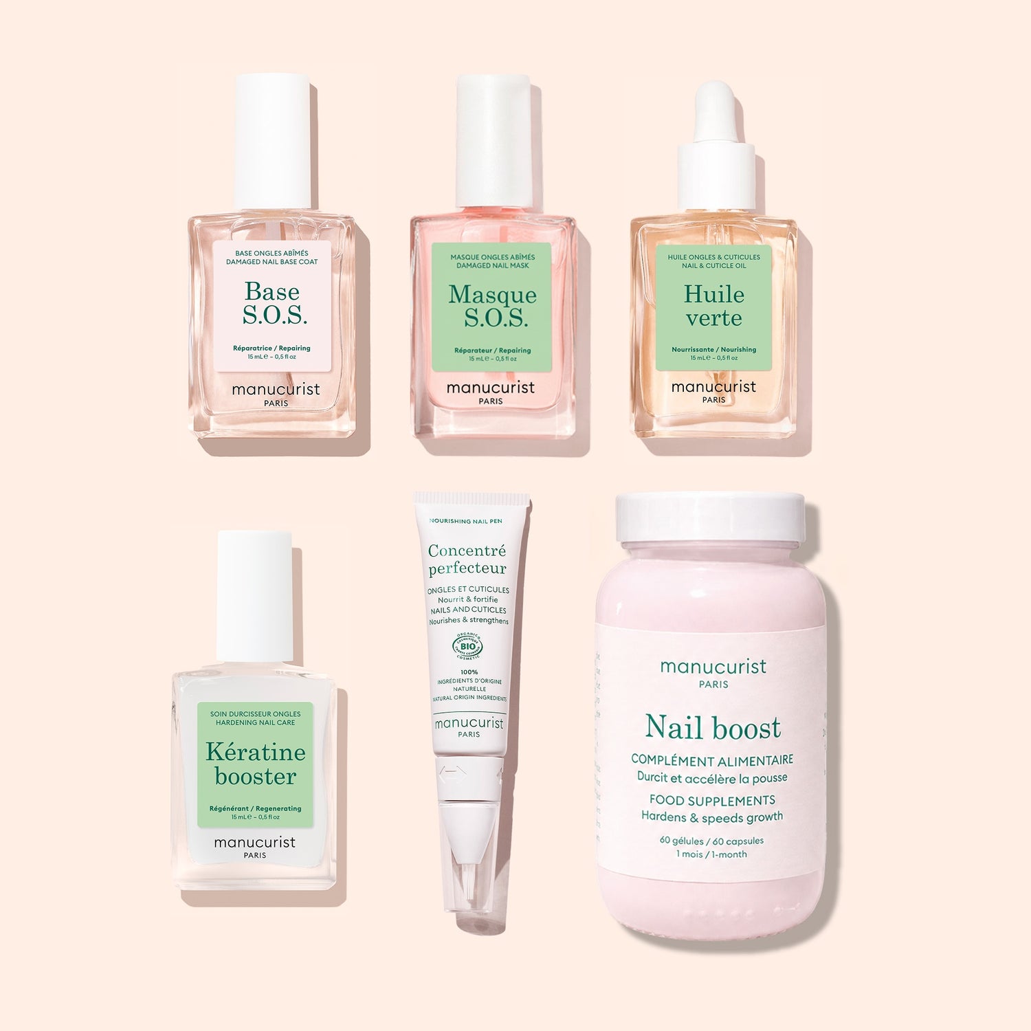 Six Manucurist Basic Routine - Damaged Nails products—including nail polishes, a serum dropper, a tube, and a bottle of supplements—are artfully arranged on a soft pink background with pastel labels, perfect for strengthening brittle nails and repairing damaged nails.