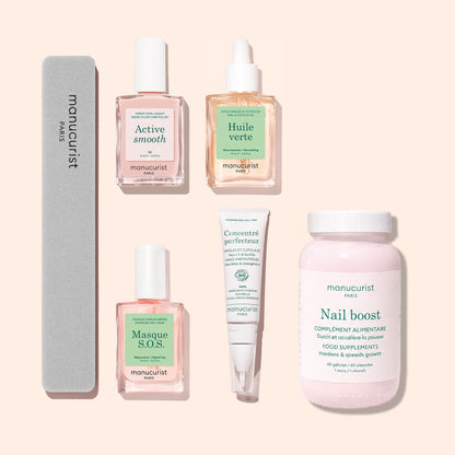 Experience the Ultimate Routine - Ridged Nails by Manucurist: a curated set featuring a nail file, three nourishing treatments designed specifically for ridged nails, a hydrating cream, and a bottle of Nail Boost food supplement—all elegantly presented on a light background for your complete nail care regimen.