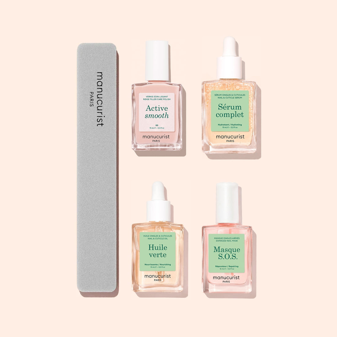 The Manucurist Basic Routine - Ridged Nails set, featuring four bottles labeled Active Smooth, Sérum Complet, Huile Verte, and Masque S.O.S. for comprehensive nail care—including ridged nails—appears beside a gray Manucurist-branded nail file on a pale background.