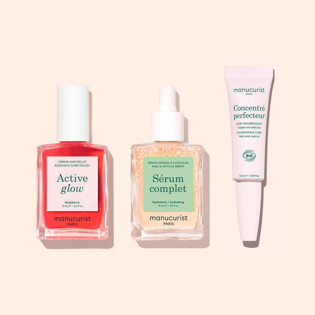 The Starter Routine - Sensitive Nails from Manucurist is displayed on a pale background, featuring three essentials: a pink Active Glow nail polish for strengthening, a Sérum Complet cuticle serum in a dropper bottle, and a white tube of Concentré Perfecteur—a complete nail care set by Manucurist.